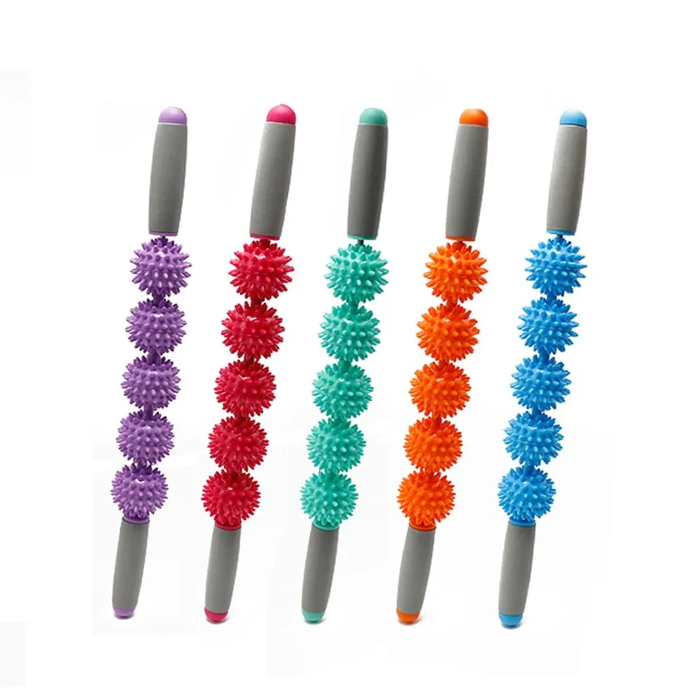 Anti cellulite massager stick with hedgehog-shaped balls and green padded ergonomic handles on a white background