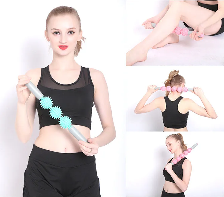 Anti cellulite massager stick with hedgehog-shaped balls and green padded ergonomic handles on a white background