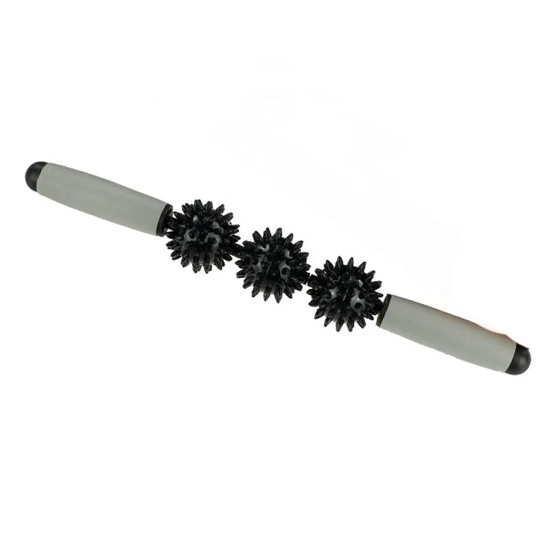 Anti cellulite massager stick with hedgehog-shaped balls and green padded ergonomic handles on a white background