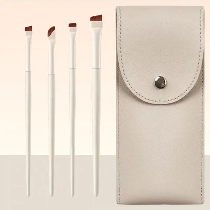 Four angled eyeliner and eyebrow brushes with ultra-thin tips in leather case