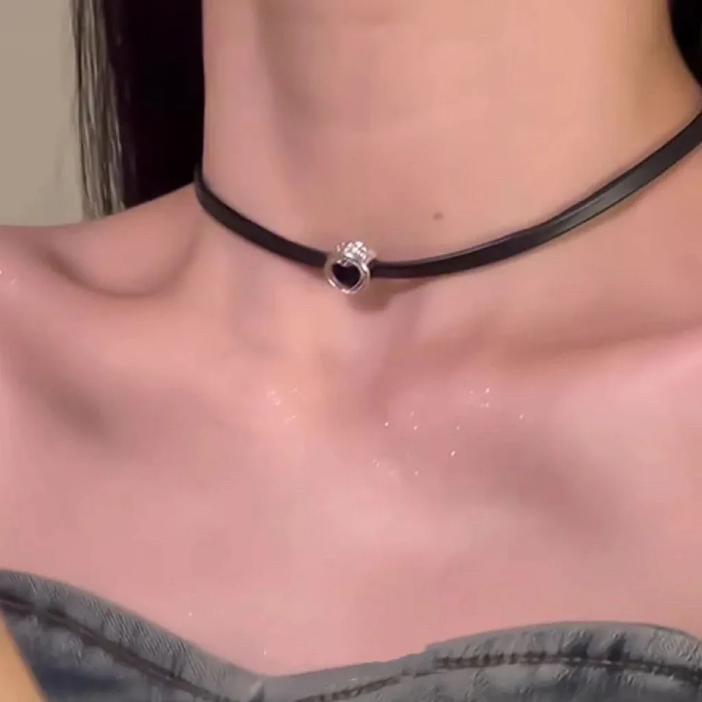 Women's multi-layer heart necklace set with alloy pendant, artificial crystal, and leather accents on an adjustable clavicle chain.