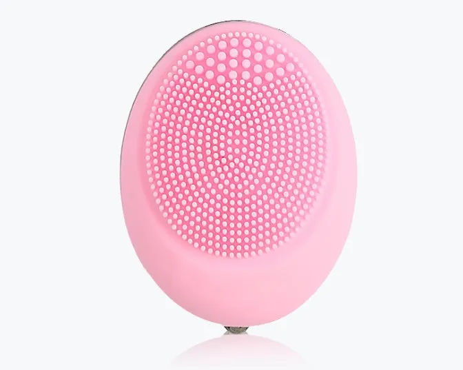 Ultrasonic electric face wash brush in pink for deep pore cleansing with vibration technology