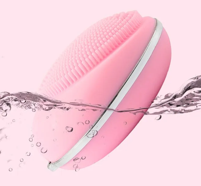 Ultrasonic electric face wash brush in pink for deep pore cleansing with vibration technology