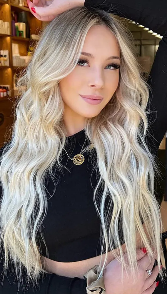 Front lace wig with medium large wavelength curly hair and long bangs for ladies in style shown