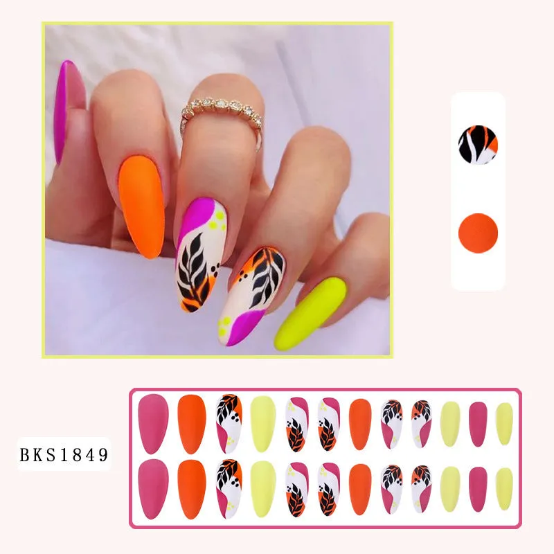 Wear Armour medium almond nail stickers with frosted tulip pattern in four designs: French leaves, leopard print, plating, and macaron