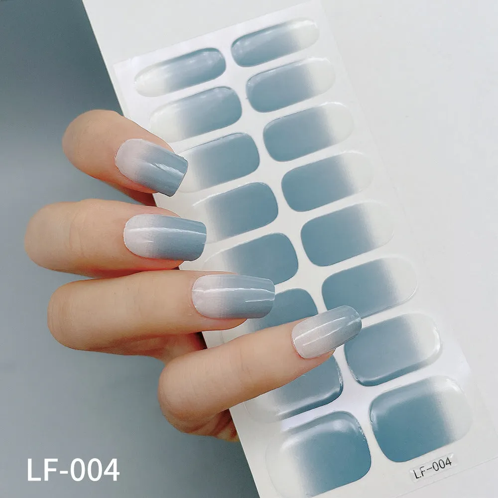 Pack of solid colour nail art stickers showing 16 different small designs including flowers, animals, and geometric patterns.