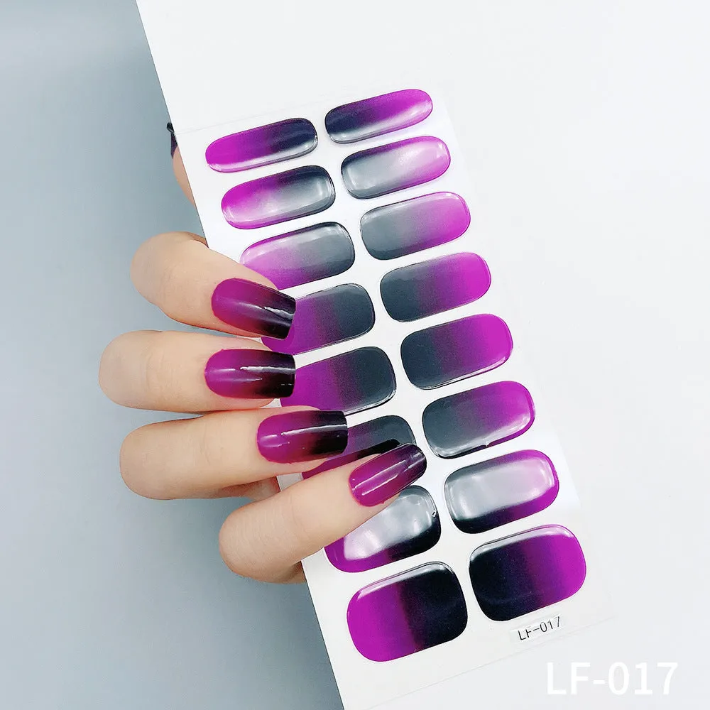 Pack of solid colour nail art stickers showing 16 different small designs including flowers, animals, and geometric patterns.