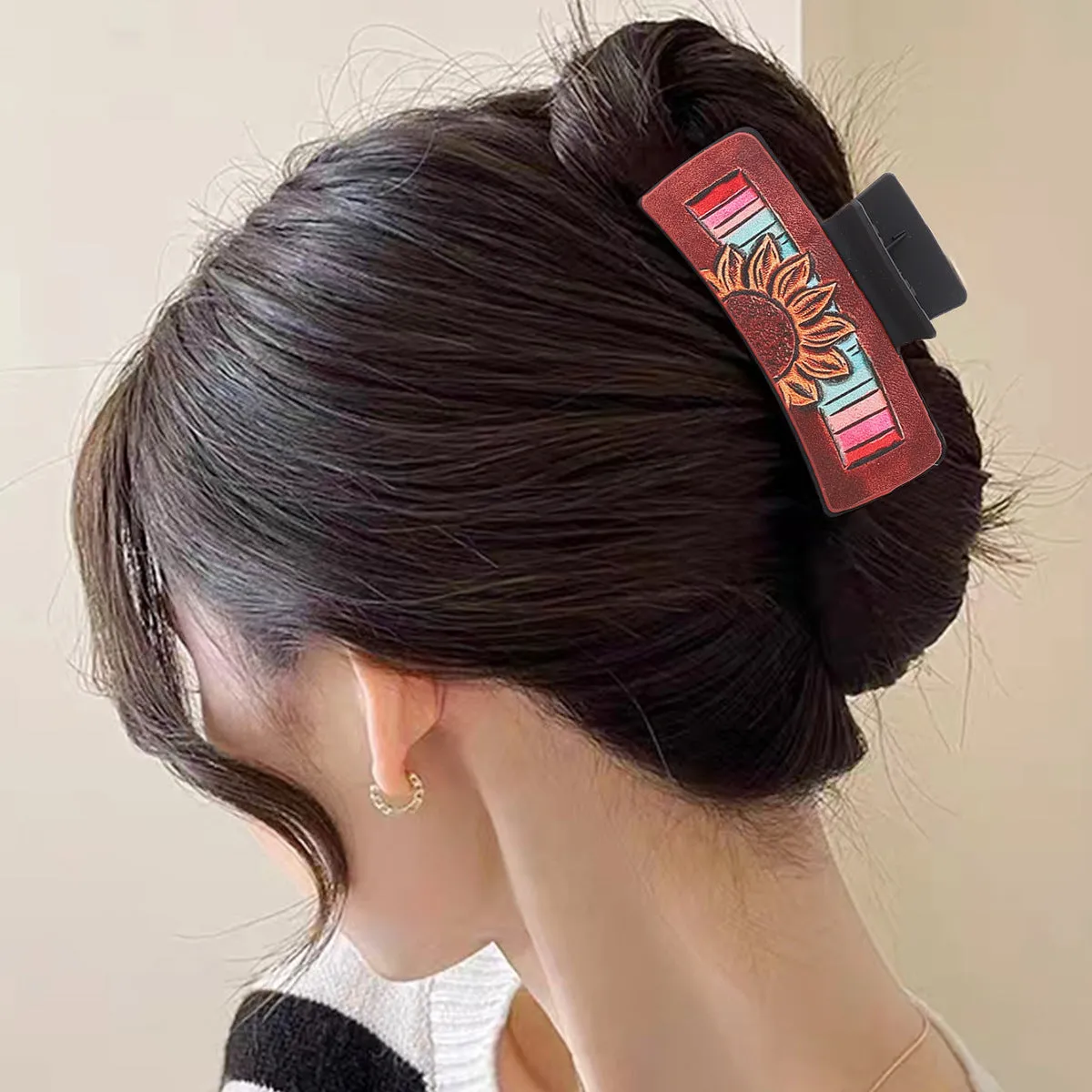 Gray artificial leather barrette with sunflower motif and denim style finish for ladies
