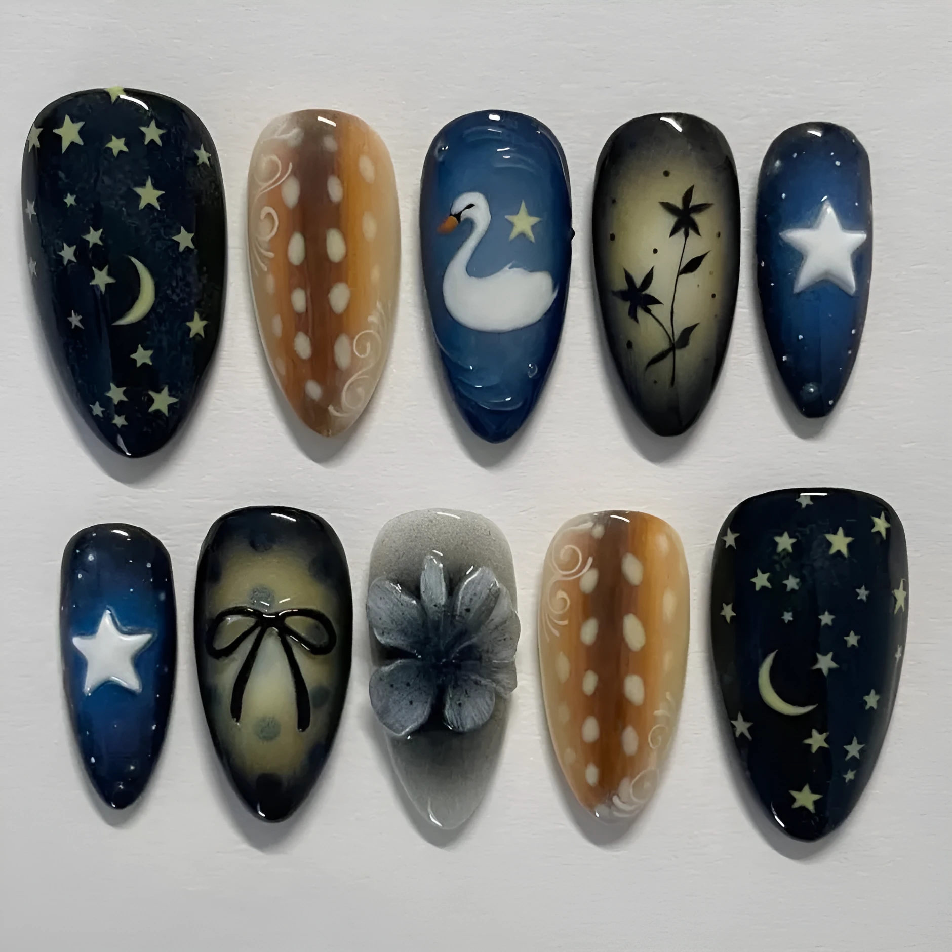 Women's French nail tip set with star moon swan bow flower pattern and glue