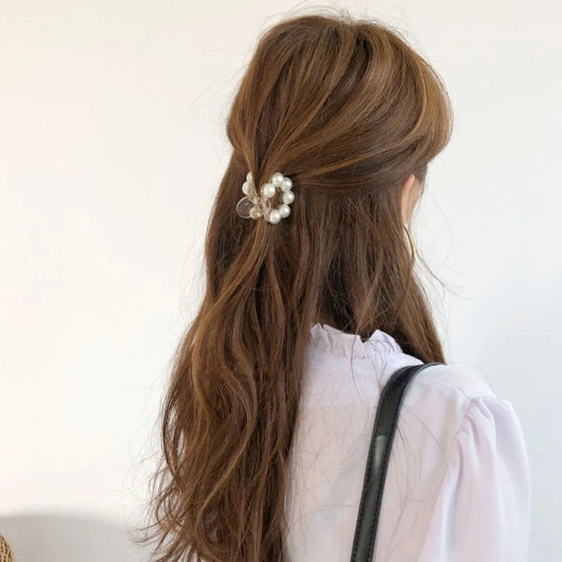 Women's pearl hair barrette in big pearl colour, manual finish, front view