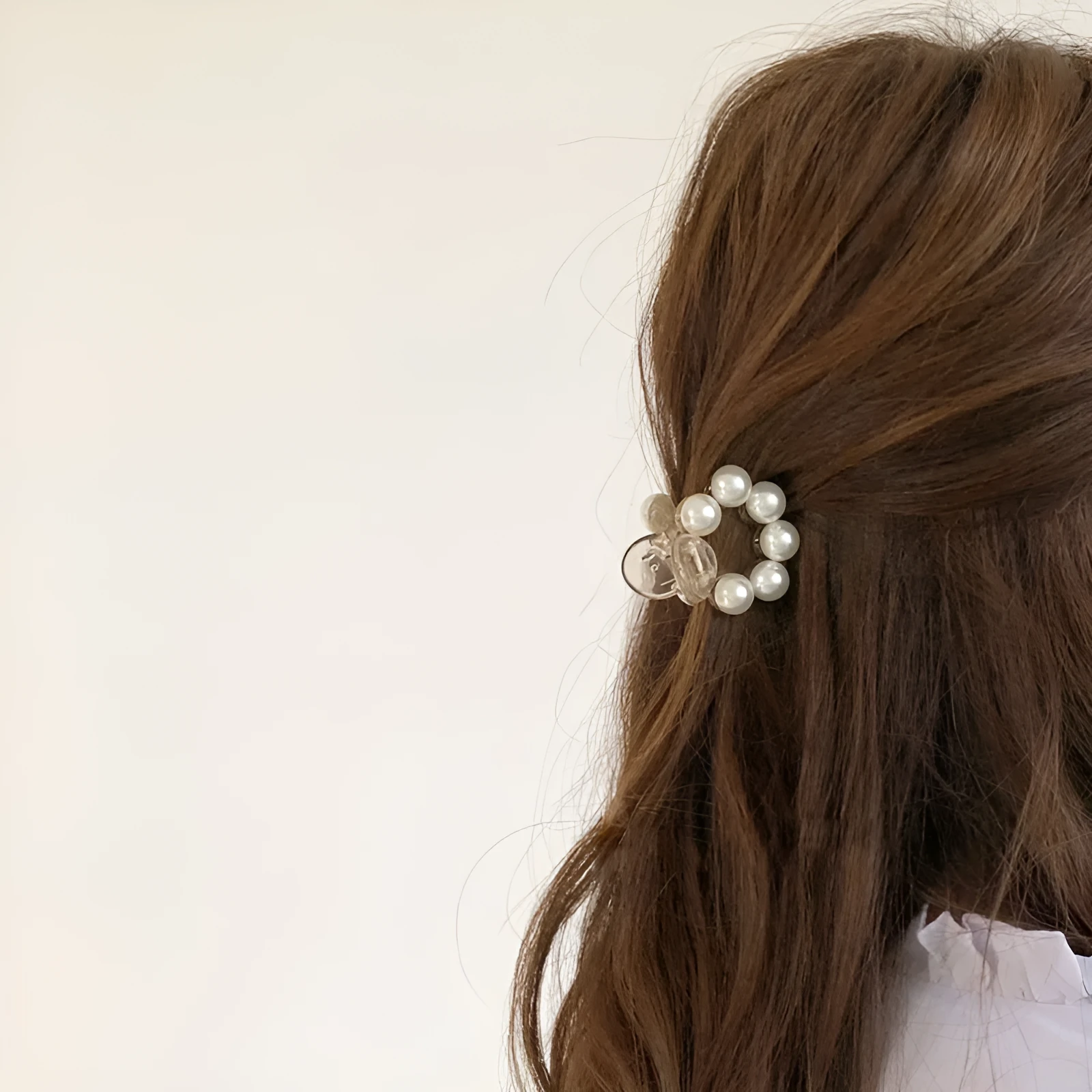 Women's pearl hair barrette in big pearl colour, manual finish, front view