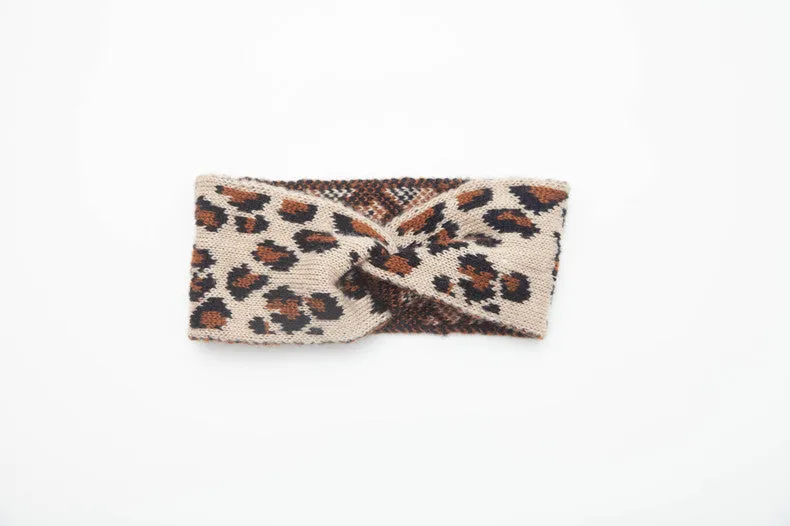 Women's leopard print acrylic bow hair band 22x10cm on a neutral background