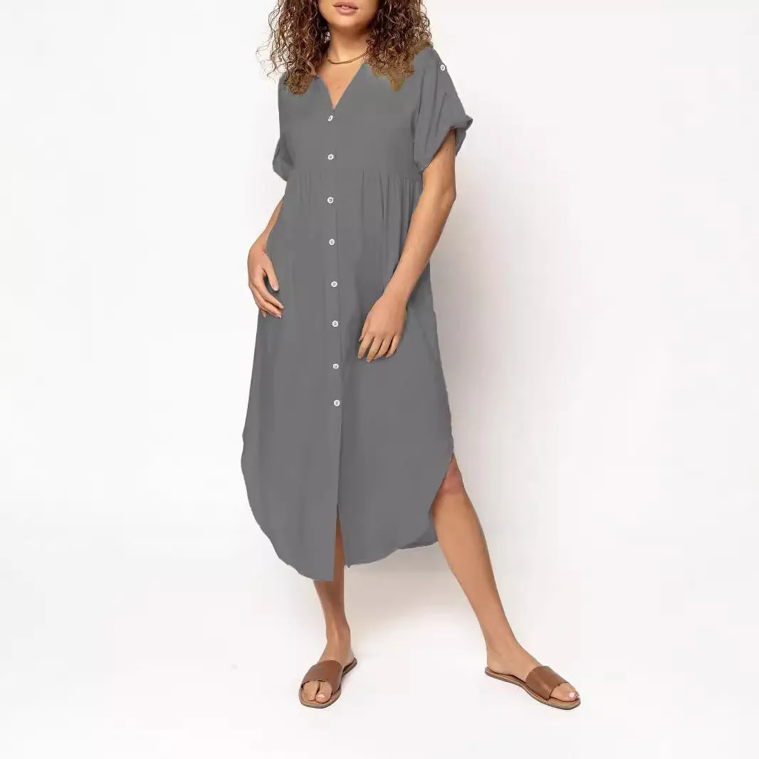 Loose-fitting casual midi dress with buttons down the front, shown in a solid colour.