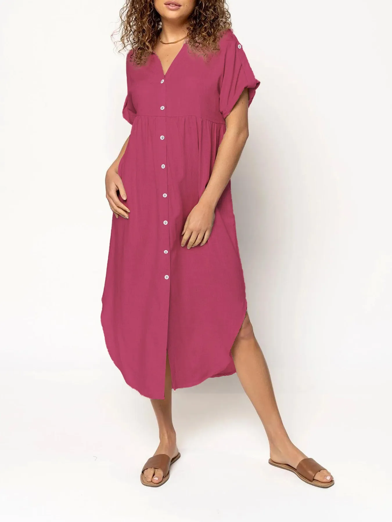 Loose-fitting casual midi dress with buttons down the front, shown in a solid colour.