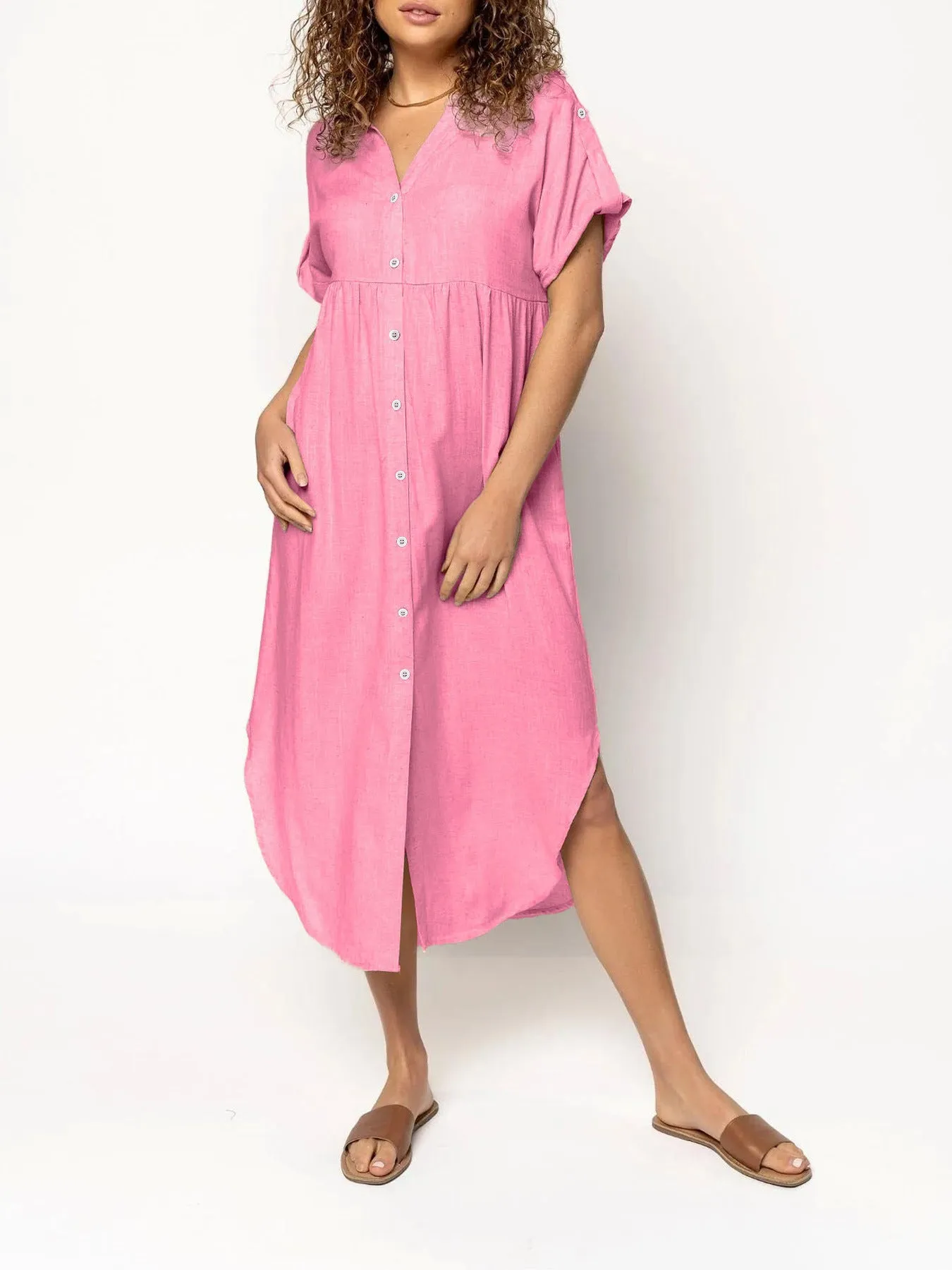 Loose-fitting casual midi dress with buttons down the front, shown in a solid colour.
