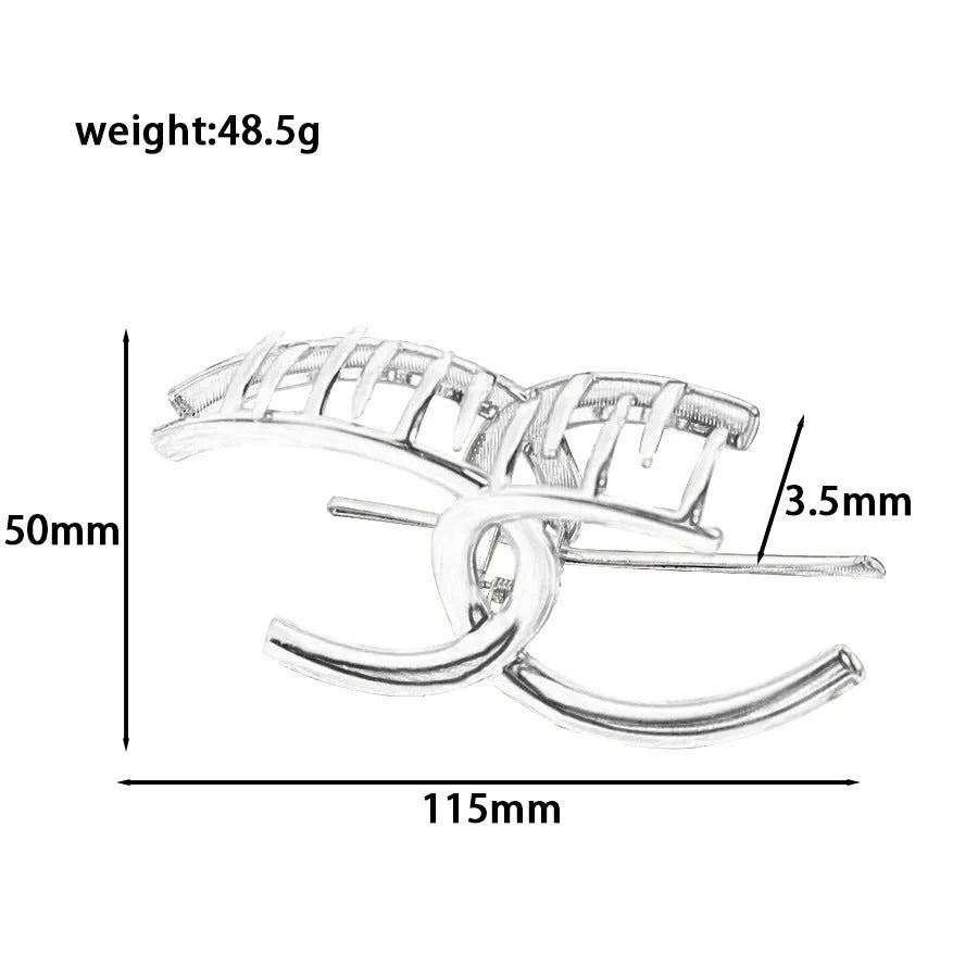 Assortment of silver metal hair barrettes and claw clips in various Korean-style designs on a white background.