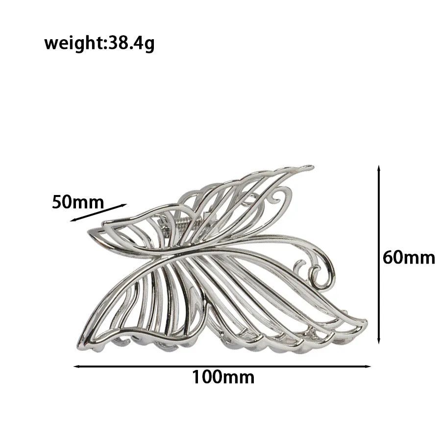 Assortment of silver metal hair barrettes and claw clips in various Korean-style designs on a white background.