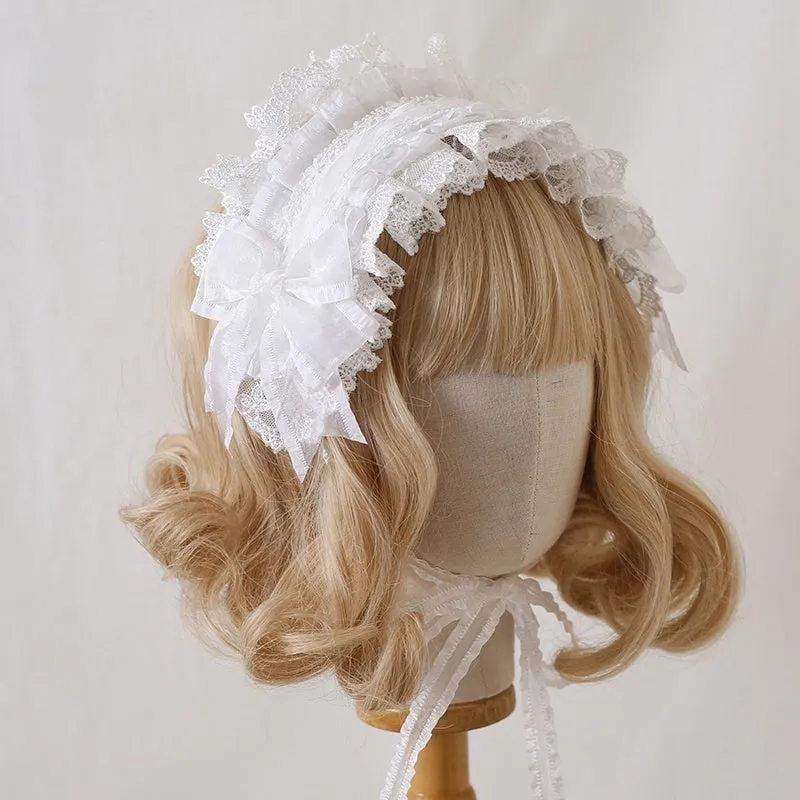 Children's hair band with bow lace detailing in light pink and white lace colour option.