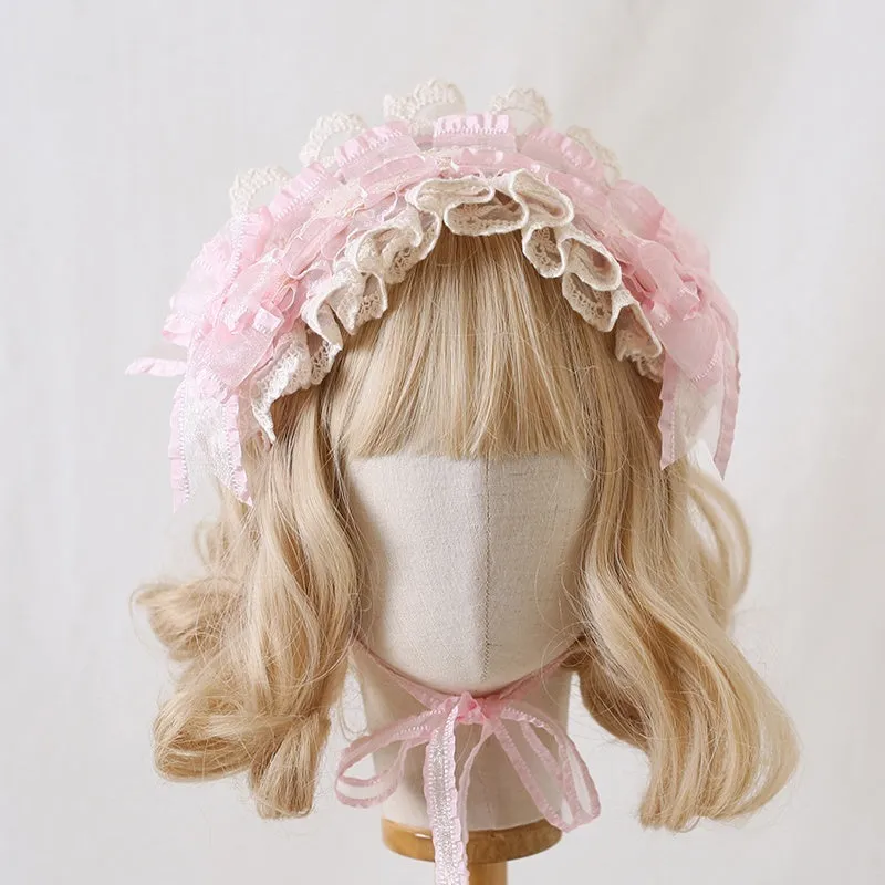 Children's hair band with bow lace detailing in light pink and white lace colour option.