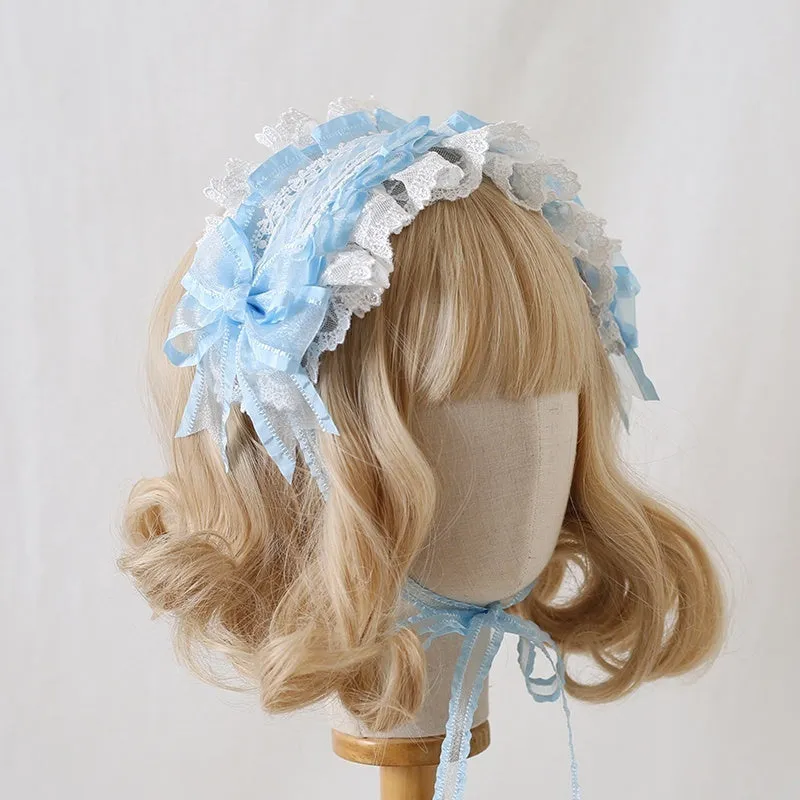 Children's hair band with bow lace detailing in light pink and white lace colour option.