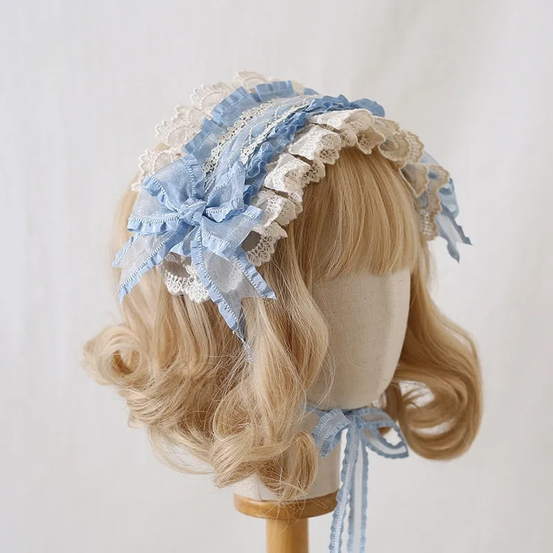 Children's hair band with bow lace detailing in light pink and white lace colour option.