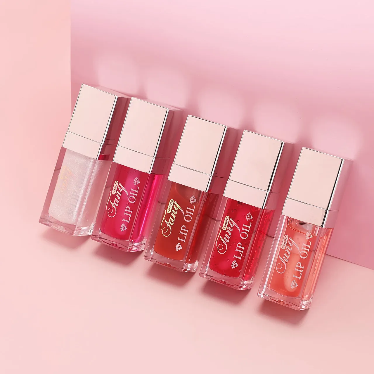 Bright hydrating mint lip gloss in five colour shades with lip essence oil