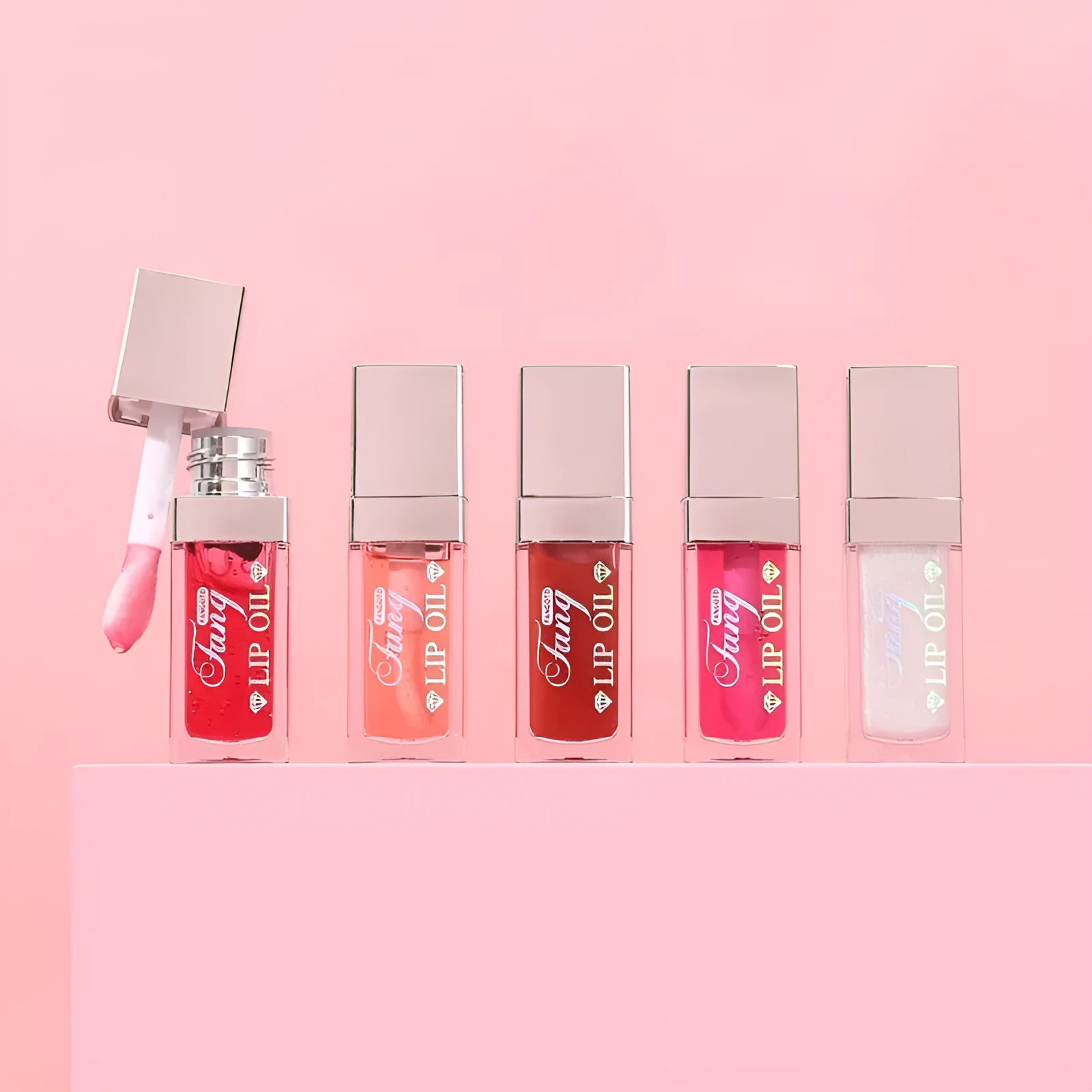 Bright hydrating mint lip gloss in five colour shades with lip essence oil