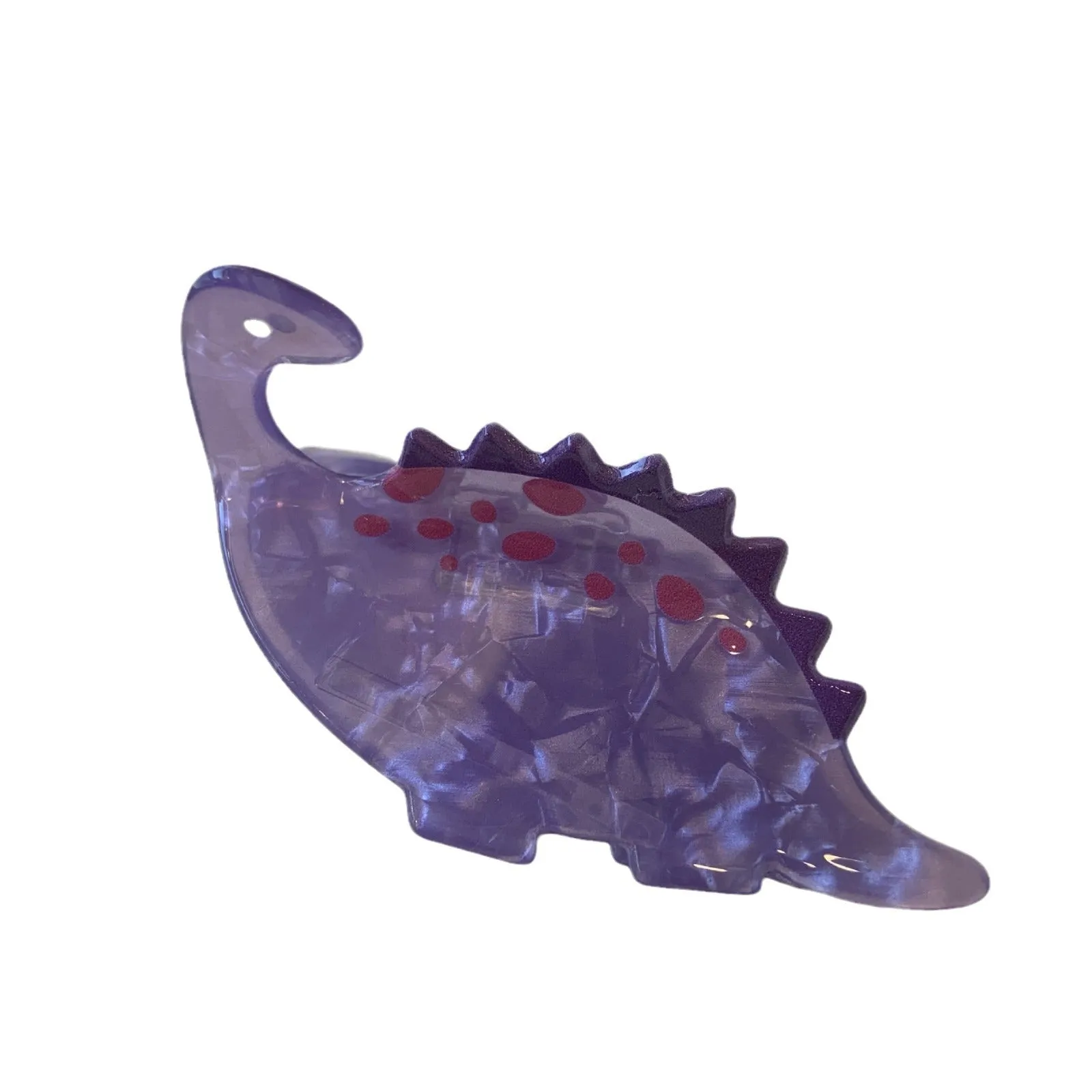 Colourful dinosaur acrylic jaw clip hairpin showing grip design with dinosaur motif