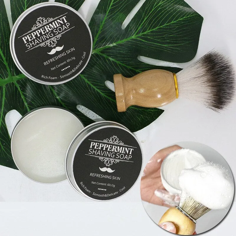 Mint scented shaving soap in aluminium box with rich foam on brush