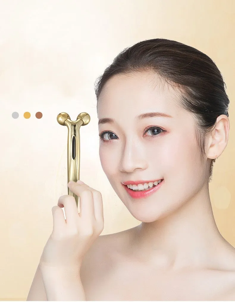 3D face-lifting manual roller massager with positive ion function in silver UV-plated finish