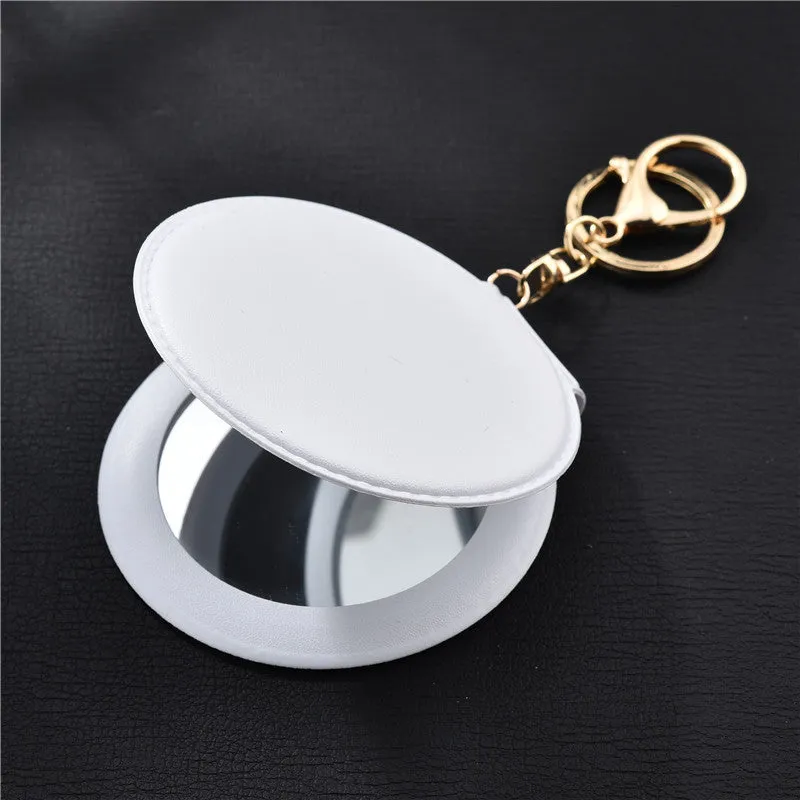 Compact round ladies leather makeup mirror with 8cm diameter glass surface and golden buckle