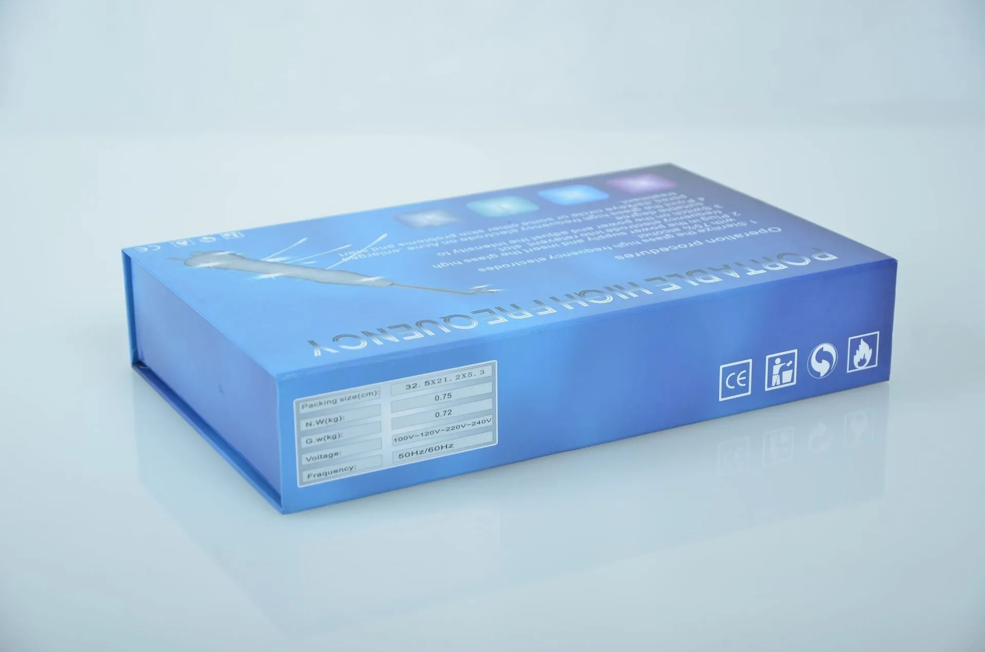 White high-frequency electrotherapy comb with four glass electrodes in packaging