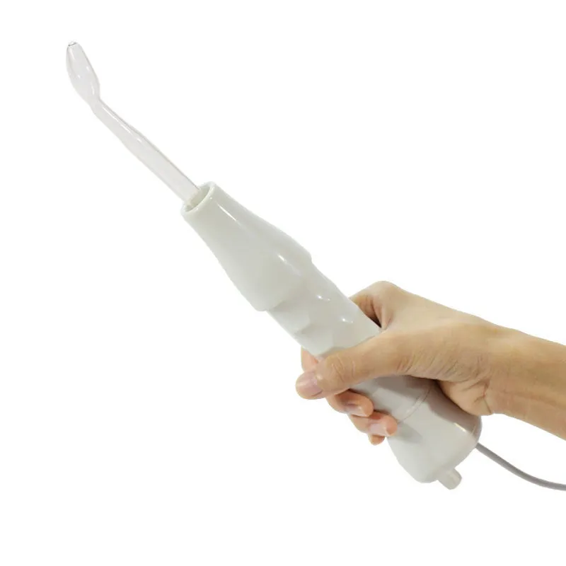 White high-frequency electrotherapy comb with four glass electrodes in packaging