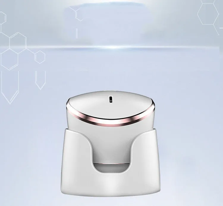 White multifunction USB charging facial cleansing massager with hot egg design, silicone brush head, and 5 vibration modes on a white background