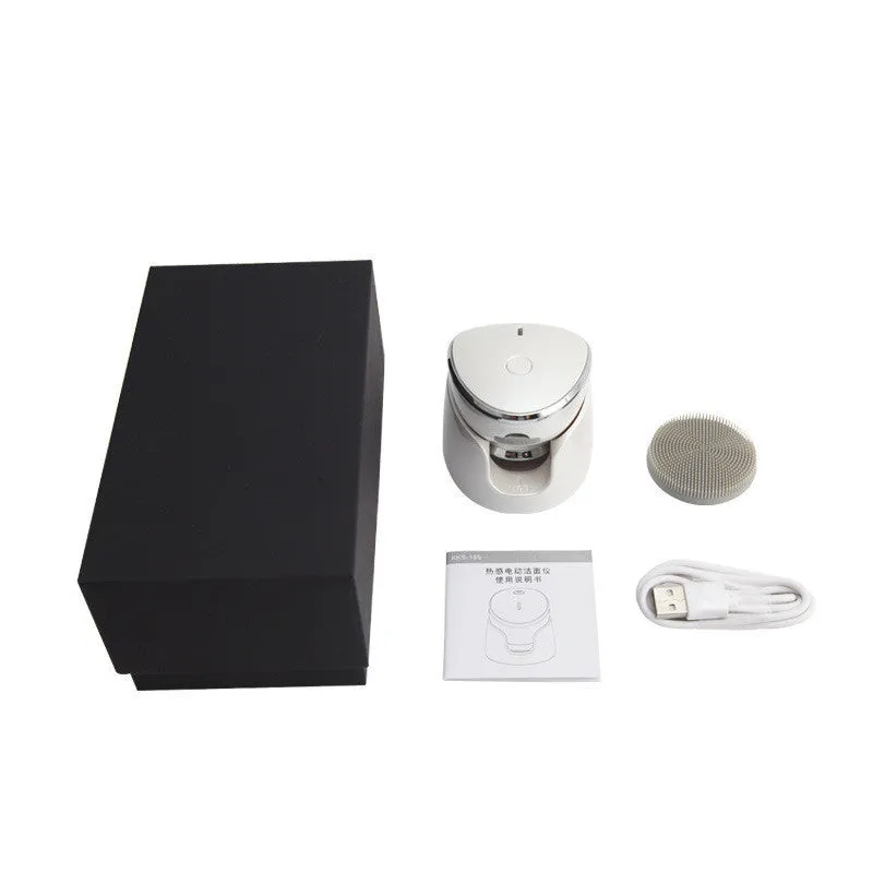 White multifunction USB charging facial cleansing massager with hot egg design, silicone brush head, and 5 vibration modes on a white background