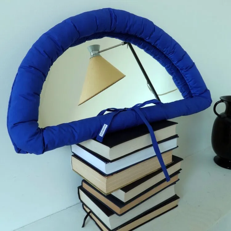 Hanging fabric mirror with soft cotton-filled backing in 23x40x5cm size