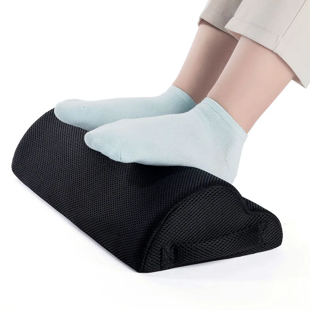 Semi-circular black foot rest pillow 40x20x10cm on floor under desk