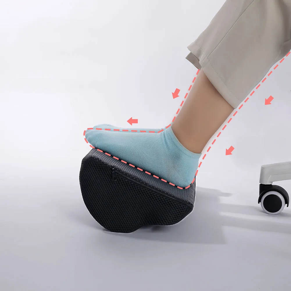 Semi-circular black foot rest pillow 40x20x10cm on floor under desk