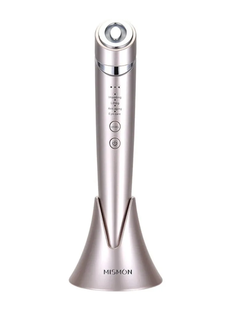 Pulse RF beauty instrument in mist blue held in hand, showing silicone head and control button