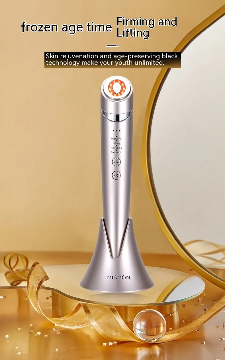 Pulse RF beauty instrument in mist blue held in hand, showing silicone head and control button