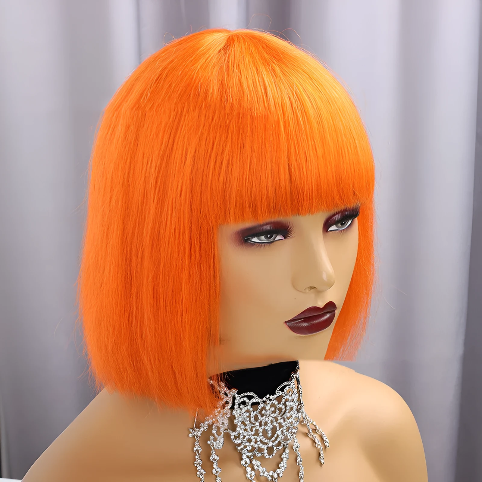 Real hair short straight wig with Qi bangs and full mechanism cap in 10 inch length on a mannequin head