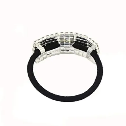 Three silver hair rings with rhinestone crystals on a light background