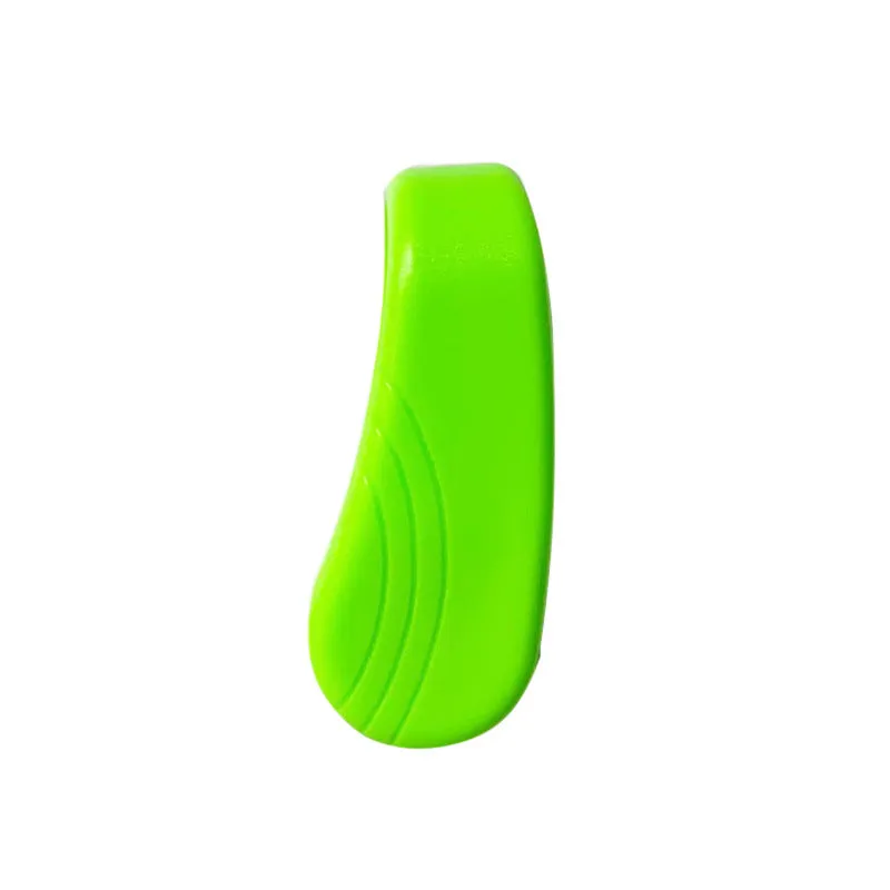 Tiger mouth massage clip multi-function acupoint massager in black on a hand, showing placement between thumb and index finger