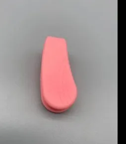 Tiger mouth massage clip multi-function acupoint massager in black on a hand, showing placement between thumb and index finger
