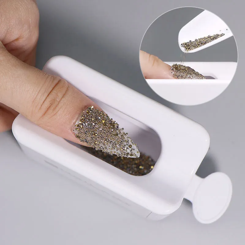 Three-layer white plastic nail powder box on a table for storing nail powder containers