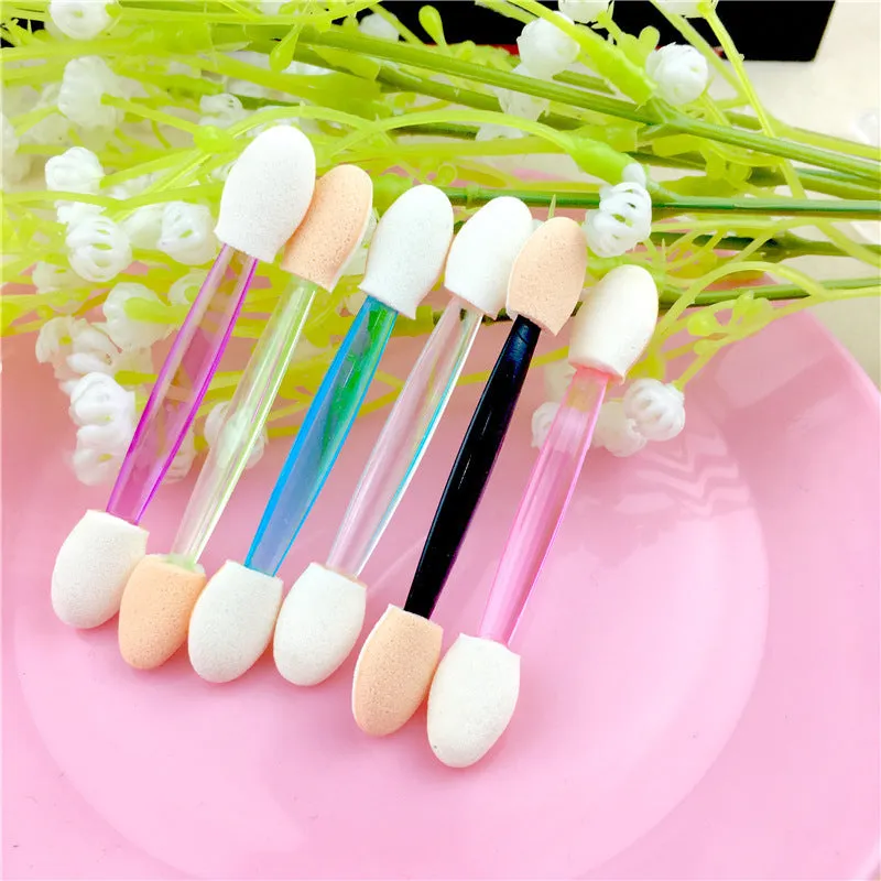 Double-ended sponge makeup brush with plastic handle in black colour for eye shadow application