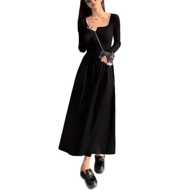 Black square collar knitted A-line dress with long sleeves and an elastic waist on a model.