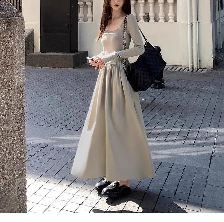 Black square collar knitted A-line dress with long sleeves and an elastic waist on a model.