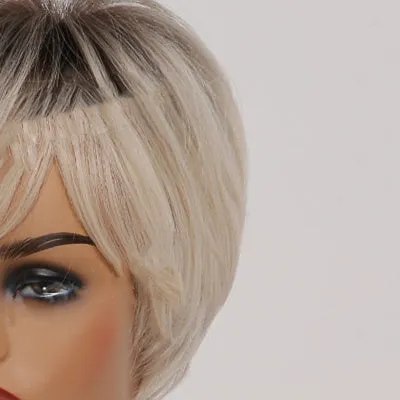 Short straight synthetic wig with ombre blonde colour, brown to gold gradient, 8-inch length and bangs on mannequin head