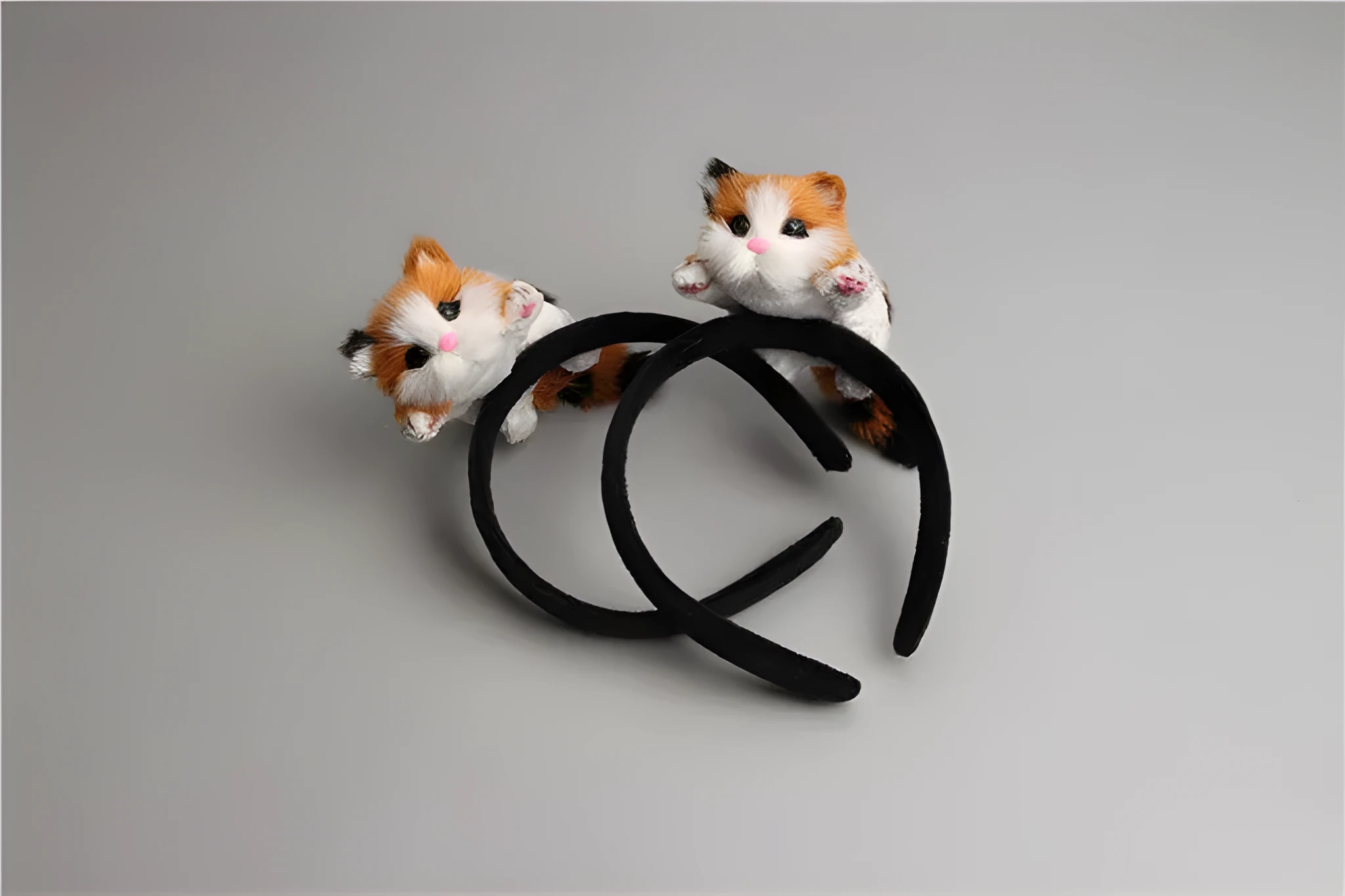 Black flannelette cat headband with 15cm kitten ears on a plain background